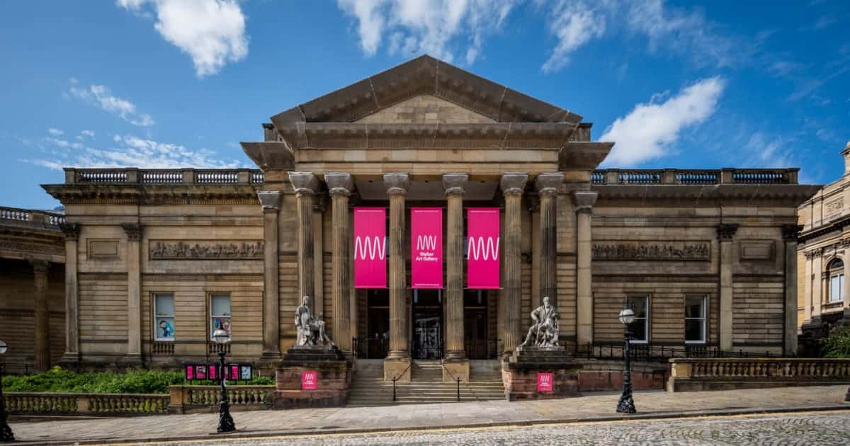 Young woman visitor using phone in the historical museum Matilda The Musical Logo